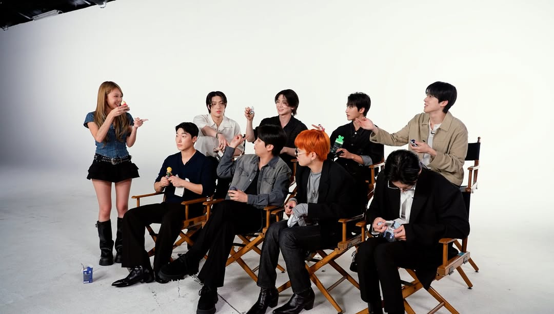 Sunny filming a studio segment with ATEEZ.